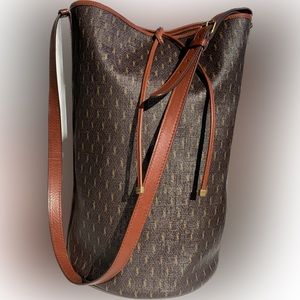 YSL Le Monogramme brown leather-trimmed printed coated-canvas bucket bag